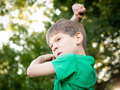 boy making a fighting pose