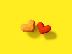 one orange and one red heart a yellow background 